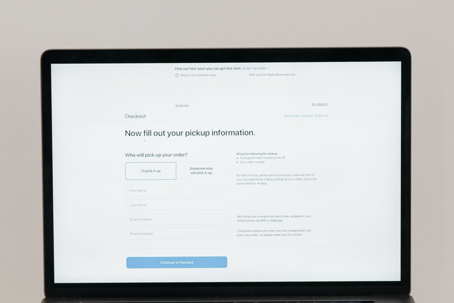 A laptop showing an online store checkout with pickup details
